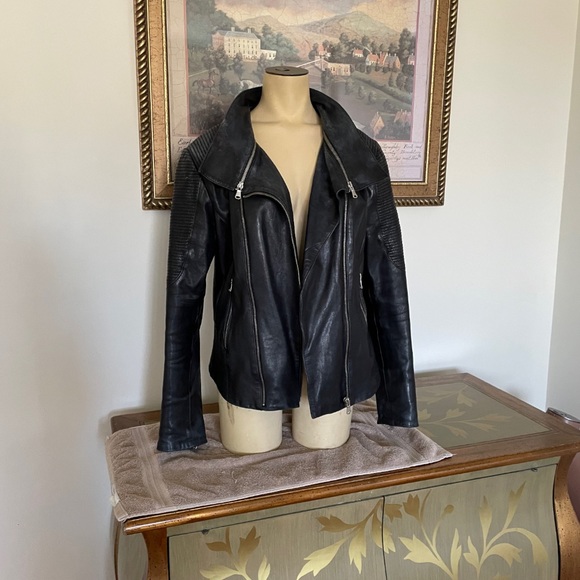 Danier Jackets & Blazers - Danier leather jacket. Multi style.